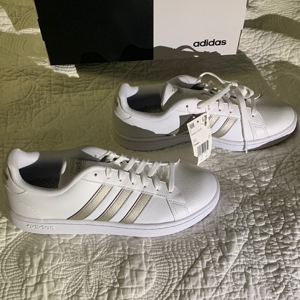 Adidas Grand Court tennis shoes. NIB women’s 9.5. White with metallic stripes.